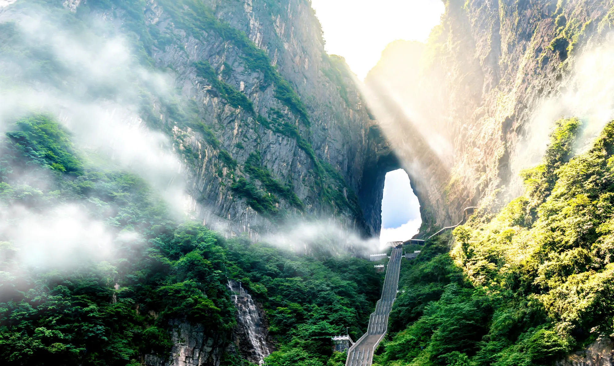 Light pouring through Heaven’s Gate, Tianmen Mountain